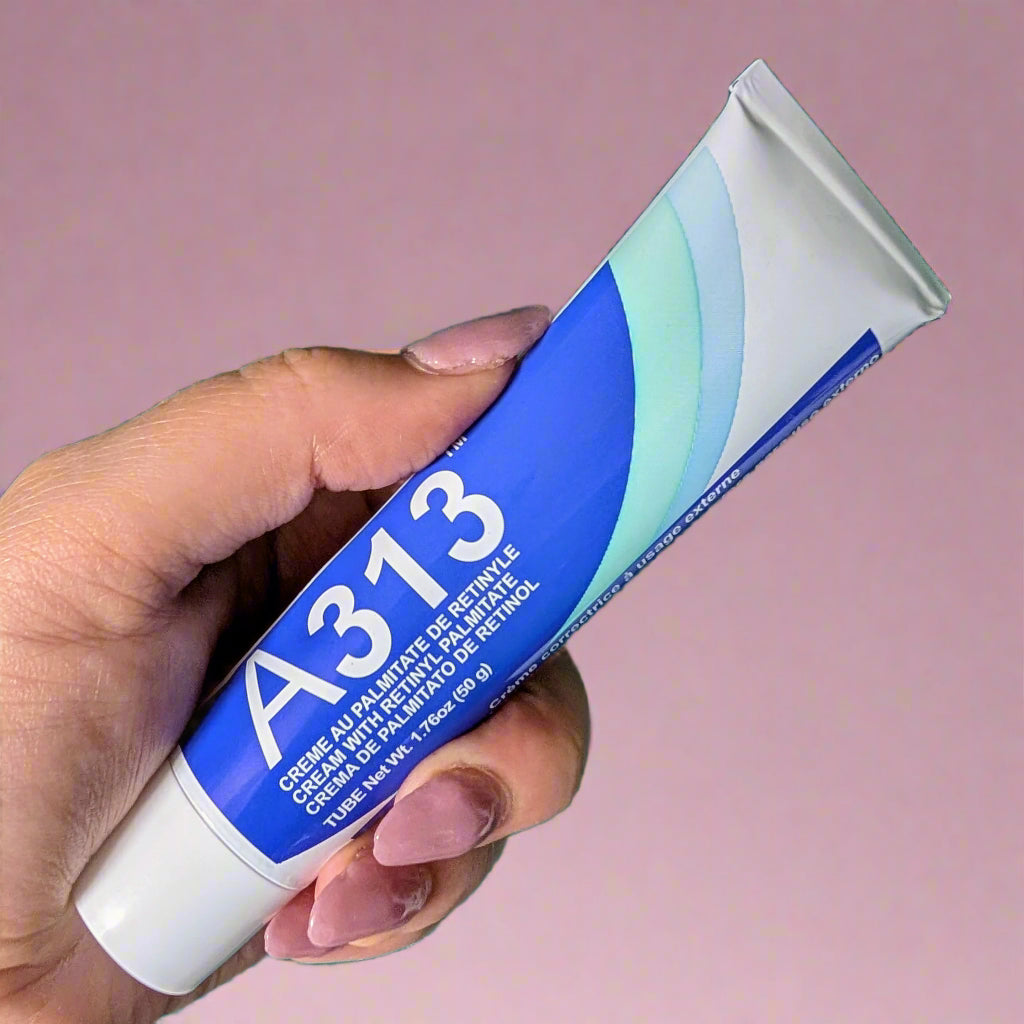 Hand holding A313 cream